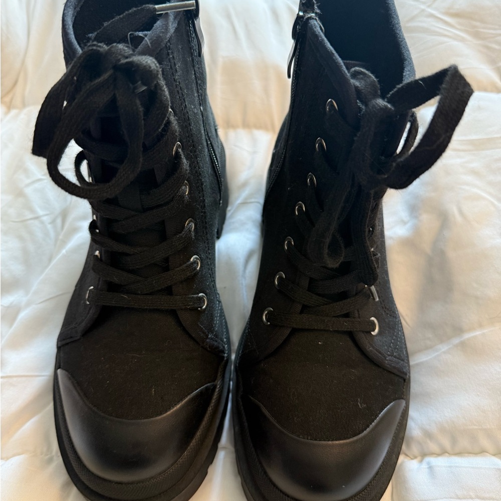 Torrid black combat boots super cute only worn once!!  Size 7